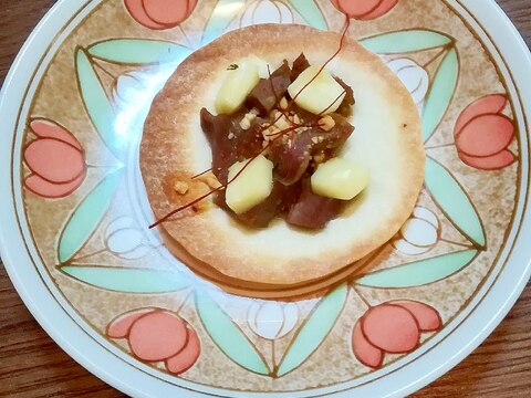 砂肝とプロセスチーズとピーナッツの餃子の皮焼き